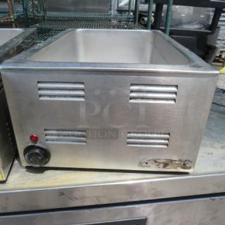 Adcraft FW-1200 food warmer, 120V, stainless steel, front knob control, red indicator light, used condition with visible wear.