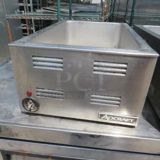 Adcraft FW-1200 food warmer, 120 Volt, stainless steel, good condition, visible Adcraft branding, dial control.