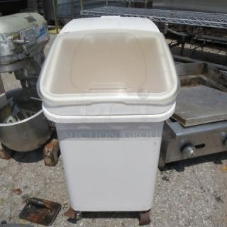 Winco Ingredient Bin on casters, model #IB-27, white with transparent lid, suitable for storage, good condition.