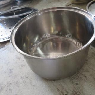 Stainless steel stock pot, size 12.5x8 inches, in good condition. Features sturdy construction, ideal for cooking.