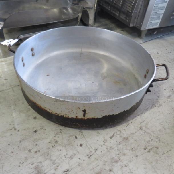 Aluminum braizing pan, 21"x5", aged condition, visible rust on base. Two sturdy handles, industrial kitchenware.