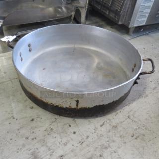 Aluminum braizing pan, 21"x5", aged condition, visible rust on base. Two sturdy handles, industrial kitchenware.