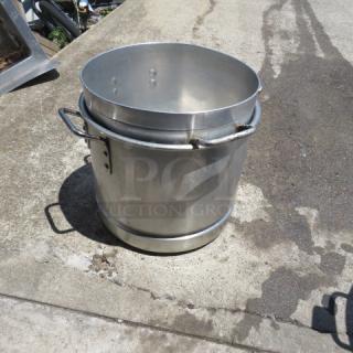 Aluminum Stock Pot 2XBID, large capacity, with side handles. Used condition with visible wear. Ideal for commercial use.