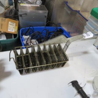 Deep Fry Taco Basket, metal construction, in good condition, features slots for multiple tacos. Tag indicates auction lot number.