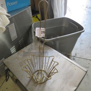 Metal deep fry taco basket with handle, taco shell shape. Item tag reads "264." Used condition.