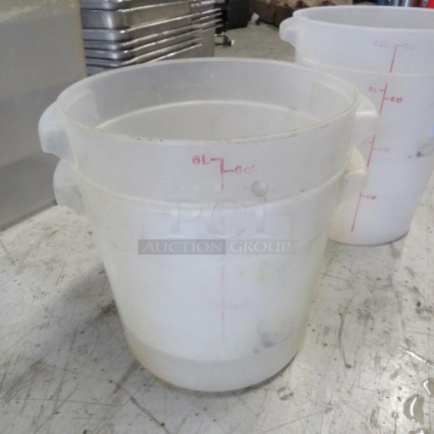 6 Quart food storage container, white plastic, with red measurement markings up to 6 quarts. Used condition.