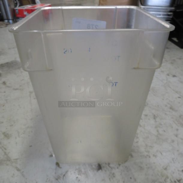 Clear 22-quart food storage container with measurement markings, square shape, no lid, and slight wear. Ideal for kitchen use.
