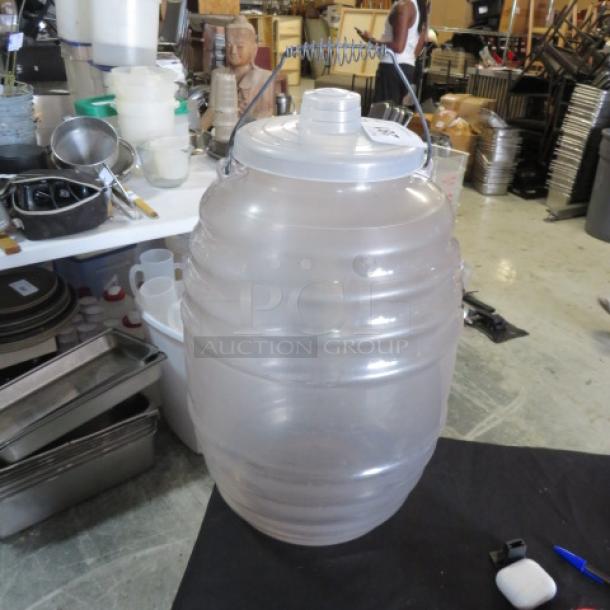 Large transparent poly container with handle and lid, labeled 3XBID, in good condition. Ideal for storage or transport.