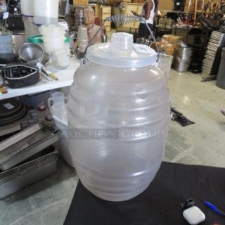 Large transparent poly container with handle and lid, labeled 3XBID, in good condition. Ideal for storage or transport.