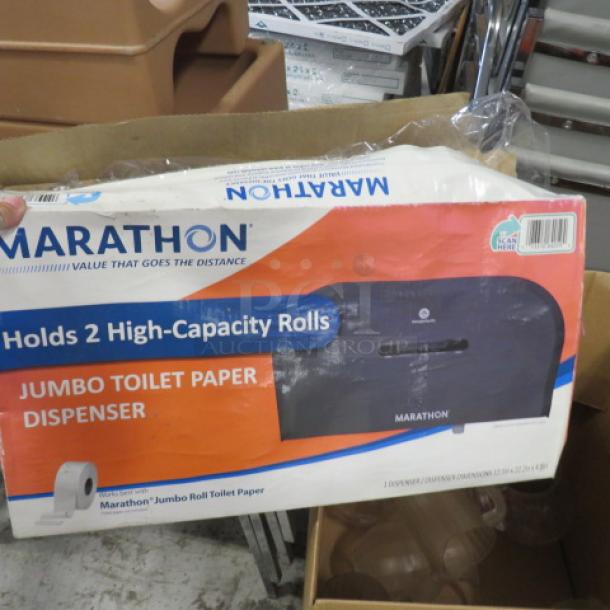 New Marathon jumbo toilet paper dispenser, holds 2 high-capacity rolls. In original packaging with branding visible.