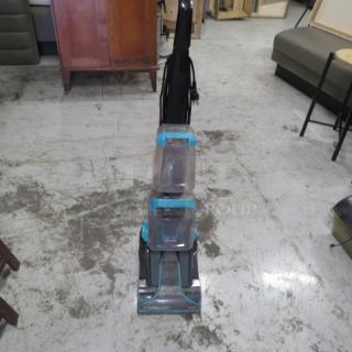 Bissell Turbo Clean Power Brush Pet Carpet Cleaner in good condition, featuring dual water tanks and pet-specific cleaning technology.