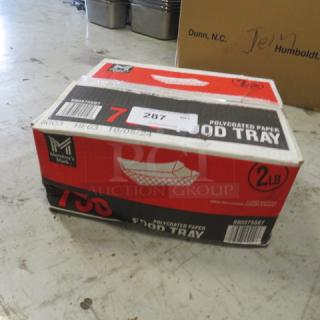 Case of Member's Mark food trays, 750 count, 2 lb capacity, poly-coated paper, new, sealed. Box labeled with product details.