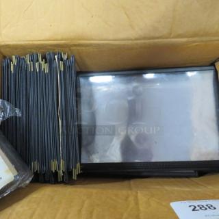 Open case of new Tablecraft menu holders, showcasing multiple black holders with gold accents, in pristine condition.