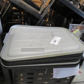 Grey Bussing Tub Lid, model 6XBID, in good condition, with label showing number 291. Stacked on dark tubs.