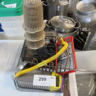 A lot of miscellaneous kitchen items including a grater, yellow hose, stackable strainers, and metal pots, tagged with number 299.