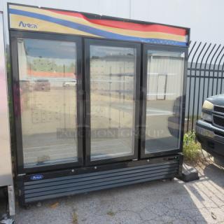 Atosa 3-door glass display cooler on casters, Model MCF8724GR, with 9 racks. 82x32x81 inches, 115V.