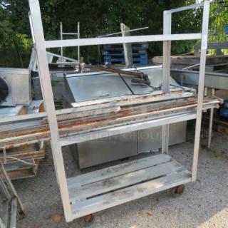 One 3-shelf aluminum dunnage rack, 48x20x67 inches, no racking included. Shows signs of wear, suitable for storage needs.