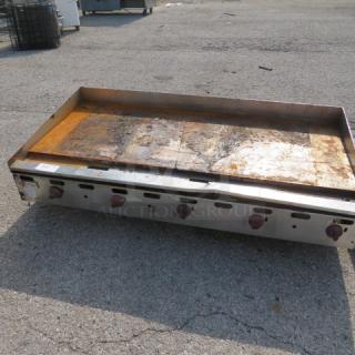Wolf Natural Gas Griddle AGM60-101, 60x32x18 inches, used condition, six control knobs, stainless steel exterior, item #101.