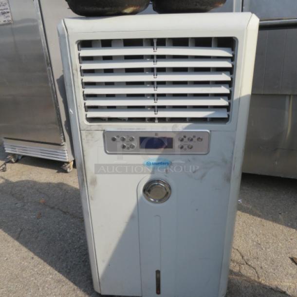 Munters portable A/C, model CCX2.5, 120V, $3771.00. Features control panel, logo label. Used condition.