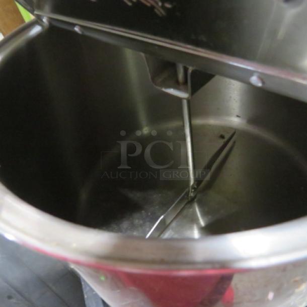 Lindys Popcorn Popper, stainless steel, interior view, showing stir mechanism, good condition.