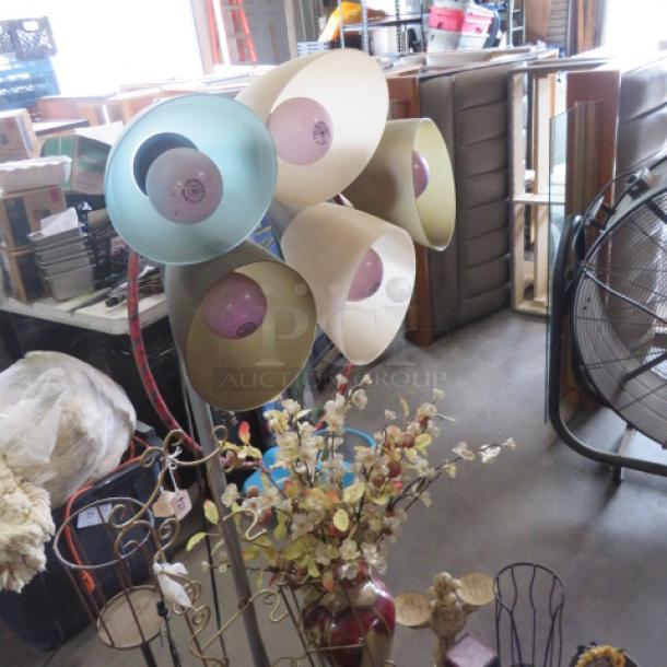 Assorted lot including multi-colored lamp with several adjustable heads, decorative items, and assorted household goods in mixed condition.