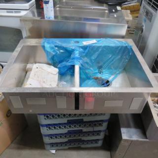 New stainless steel drop-in 2-compartment sink, 33x22x9 inches, with protective blue film, no visible wear.