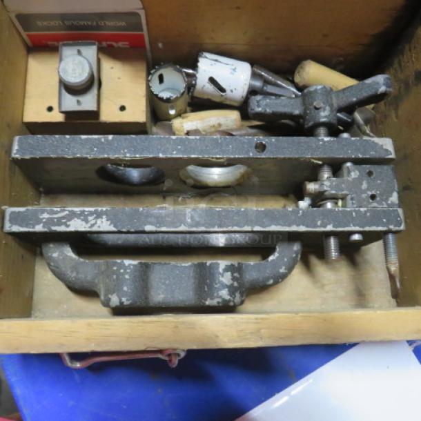 Stanley skew combination plane with wooden carry box, visible wear, includes assorted components and attachments.