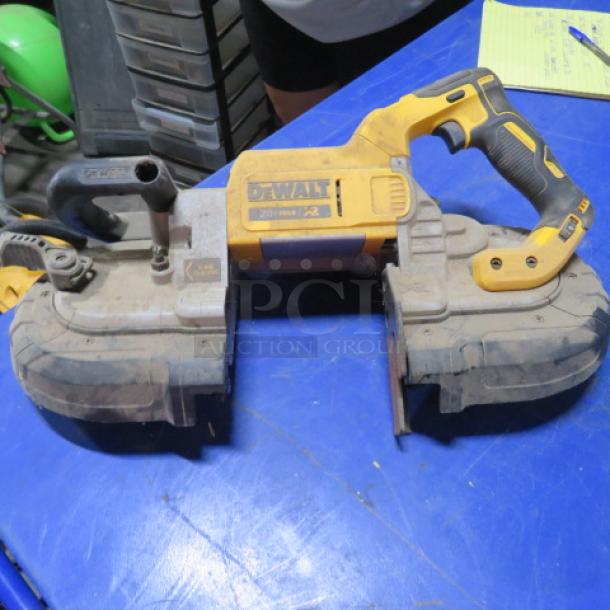 Dewalt cordless brushless portable band saw, used condition. Features ergonomic handle, visible Dewalt branding.