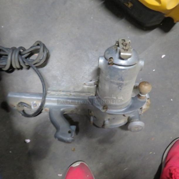 Stanley Sabre Saw #J-5, vintage model, metal casing, attached power cord, used condition, visible wear marks.