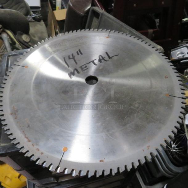 14-inch Ever Fast saw blade for metal, used condition, visible surface rust, marked with "14'' METAL".