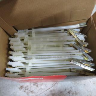 A box of new Hilti toggle bolts, featuring metal and plastic components, suitable for heavy-duty fastening.