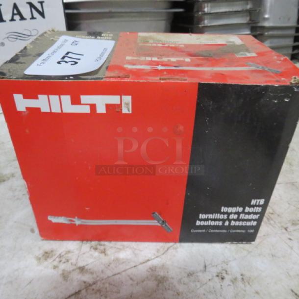 Box of Hilti HTB toggle bolts, contains 100. Red and black packaging, in new condition with factory markings.
