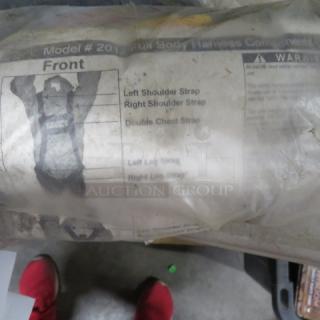 New Full Body Harness in packaging, Model #2012, includes diagram and safety warnings, unused condition.
