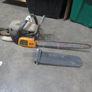 Poulan 18-inch chainsaw with protective blade cover, used condition, visible model markings on side, ideal for auctions.