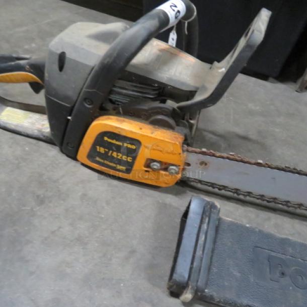 Poulan 18-inch chainsaw, model 18"/42cc. Features visible wear, metal guide bar, and branded side panel for specifications.