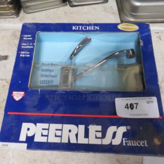 New Peerless Faucet P8500, chrome finish, in original packaging. Easy installation. Model displayed in box.