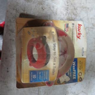 Korky WaxFREE toilet seal in packaging, red and black, new condition, labeled as easy to install and no leaks guaranteed.