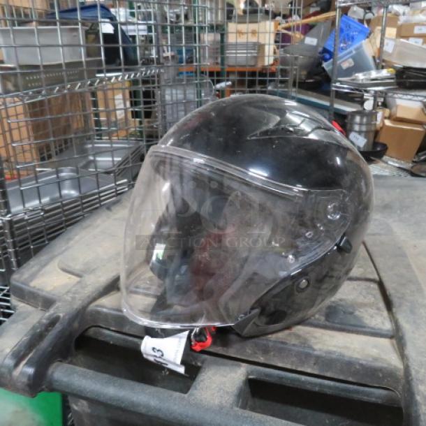 XXL Bilt motorcycle helmet with clear visor, black finish, lightly used, FMVSS #FMVSS certified, minimal wear visible.