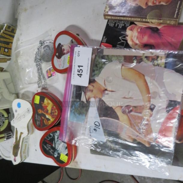 One Lot of Elvis/Marilyn Monroe collectibles, including photos, tins, and keychains. Mixed condition. Tags and labels visible.