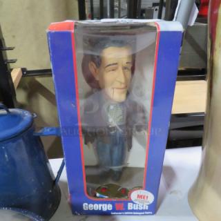 Vintage George Bush collectible figure, boxed, in excellent condition with the original packaging and clear display window.