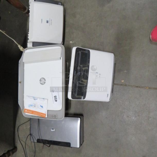 Assorted printers lot, featuring models from HP and other brands. Various sizes and conditions, including power cables.