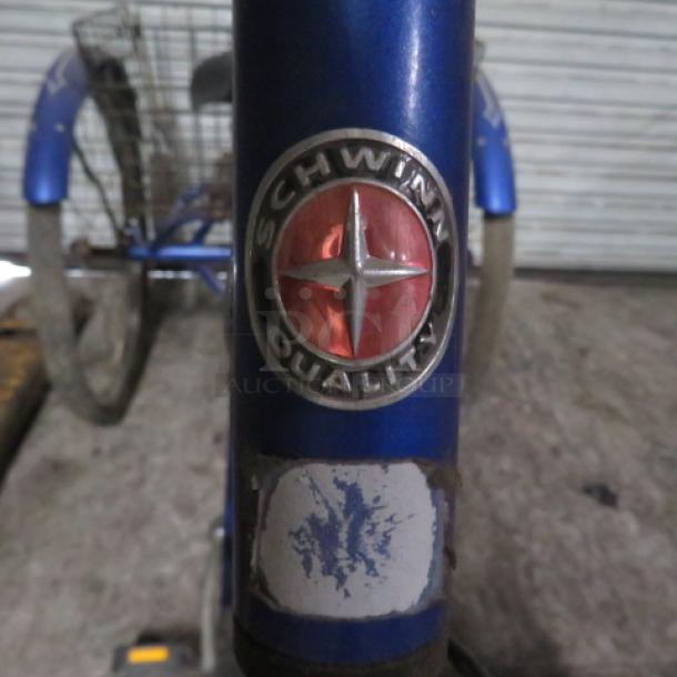 Vintage Schwinn Meridian tricycle, blue, features rear basket, Schwinn Quality badge, fair condition, $599.00.