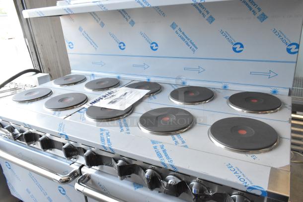 Brand new Imperial 10-burner stainless steel hot plate range with 2 ovens, overshelf, backsplash. Scratch and dent condition.