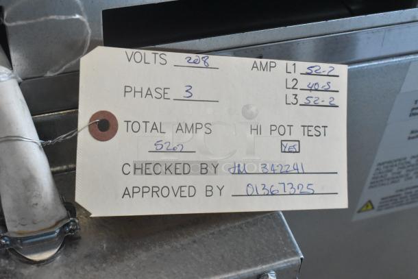 "Imperial commercial electric hot plate, 10 burners, 2 ovens; voltage 208, phase 3, total amps 52.2, hi pot test approved."