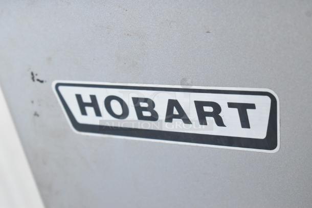 Hobart Legacy HL400 dough mixer, stainless steel bowl, bowl guard, whisk, dough hook; metal body, robust, commercial quality.