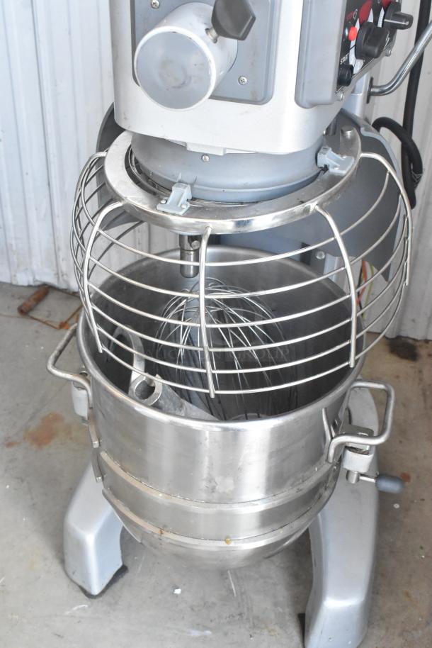 Hobart Legacy HL400 commercial 40 qt dough mixer with stainless steel bowl, bowl guard, whisk, and dough hook.