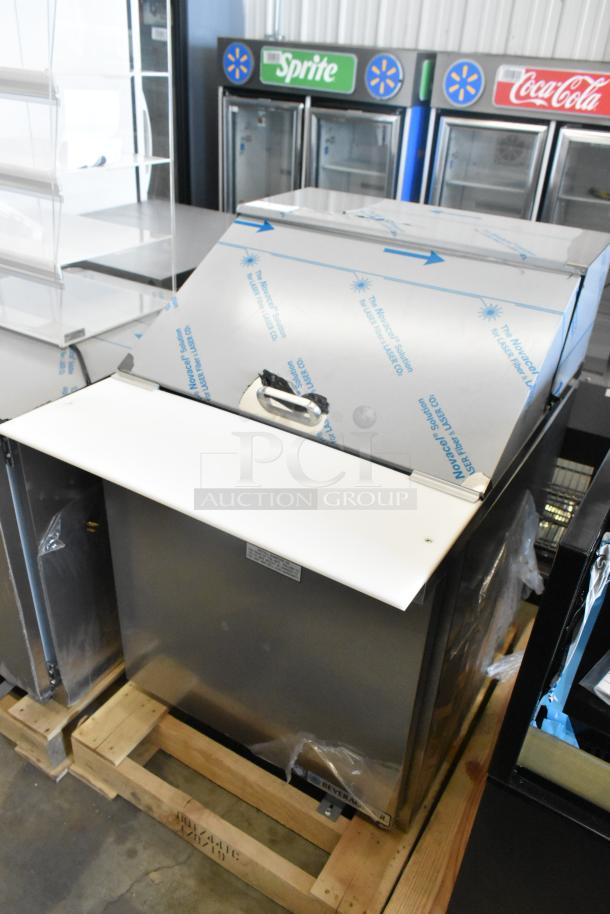 BRAND NEW Beverage Air SPE27HC-12M stainless steel prep table with minor scratches. 115V, 1-phase. Mega top design.