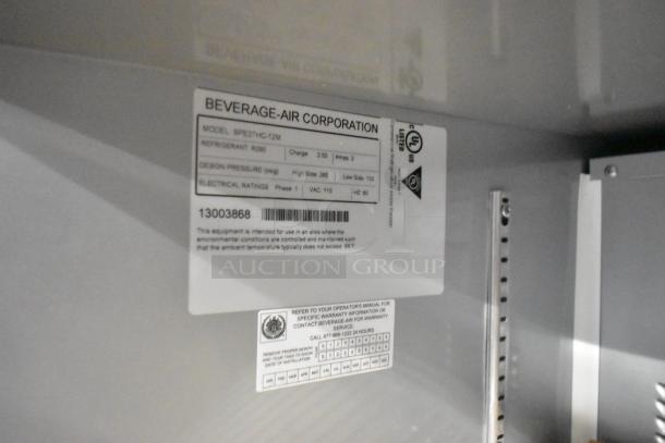 BRAND NEW Beverage Air SPE27HC-12M sandwich prep table, stainless steel, 115V, 1 phase. Visible label with specs. Scratch and dent condition.