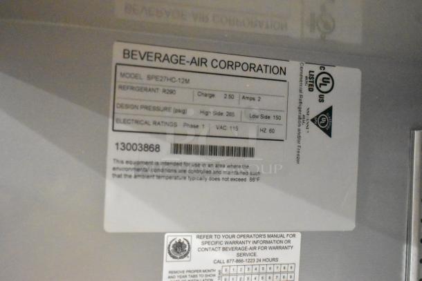Label on Beverage Air SPE27HC-12M prep table. Lists model, refrigerant R290, and electrical ratings: 115V, 1 phase.