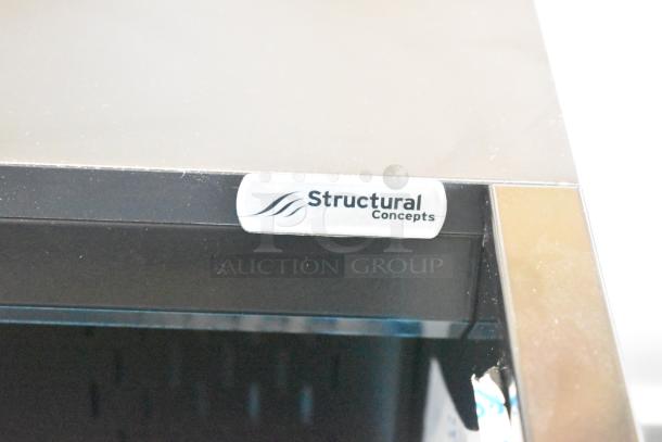 Brand new Structural Concepts Oasis metal undercounter air curtain merchandiser, model CO3324R. Displays "Structural Concepts" label.